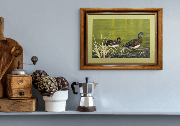 A peaceful depiction of two ducks wading through calm, shallow waters as the light of early morning casts soft reflections on the surface. The warm hues of the background blend harmoniously with the serene green tones of the water, evoking a sense of quiet tranquility.