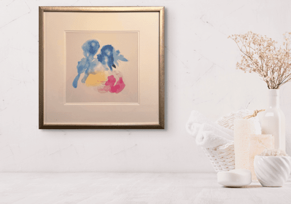 The gentle and fluid nature of abstract watercolour art, through soft hues and delicate brushstrokes makes the splashes of blue, pink, and yellow interact in a harmonious yet subtle dance, inviting viewers to interpret the scene through their personal lens.