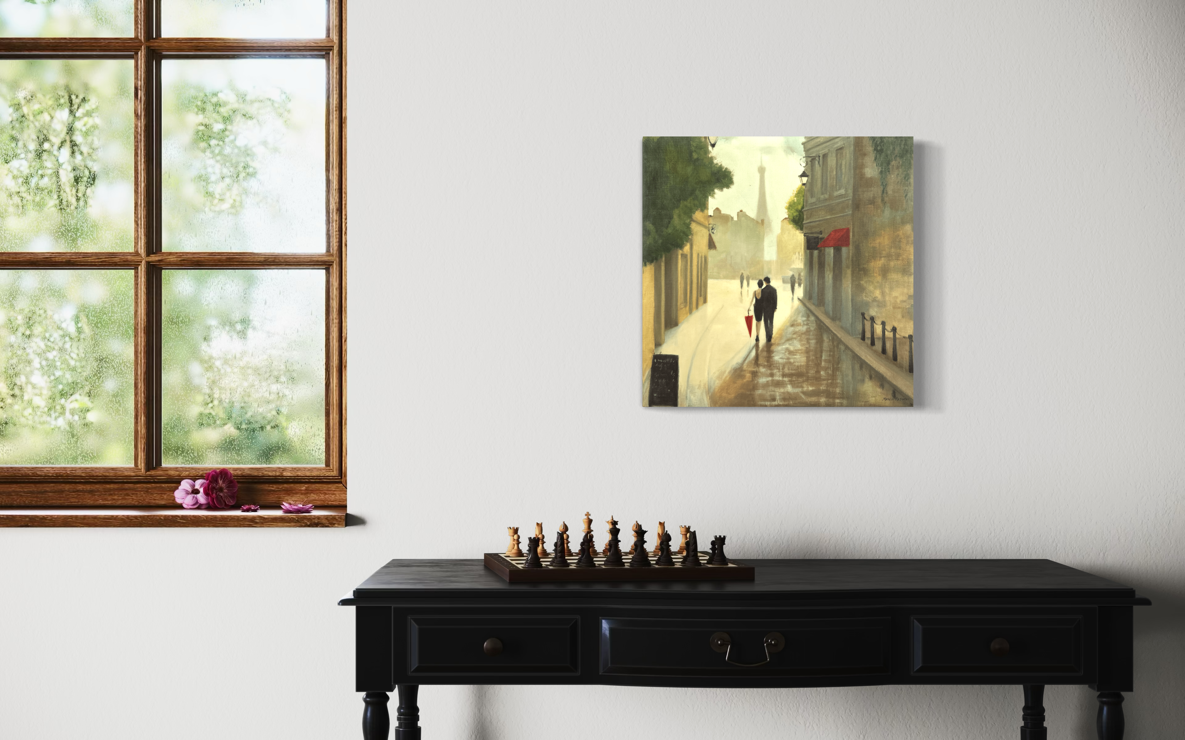 A couple walks arm-in-arm down a misty Parisian street, the Eiffel Tower faintly visible in the background. With a single pop of color from a red umbrella, this scene captures the timeless romance of Paris, drawing viewers into a world of elegance and quiet intimacy.