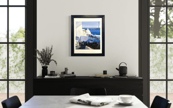 A beautiful scene of a Mediterranean terrace overlooking the sea, filled with cool blues and inviting sunlight. The composition, with chairs and a potted flower in the foreground, captures the peaceful charm of a coastal morning.